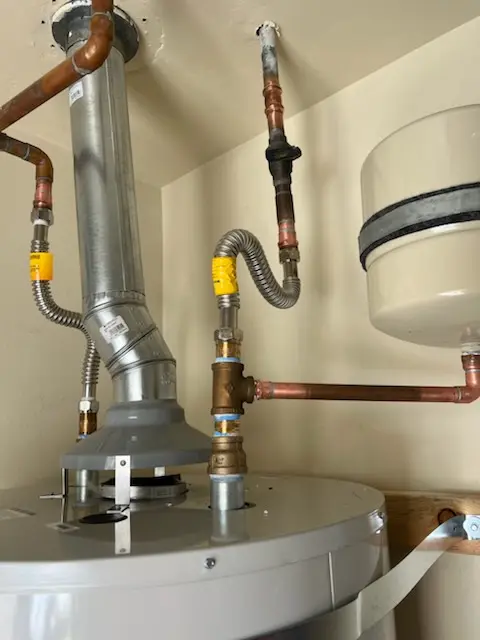 Water heater installation and plumbing repair in Wolfe Park